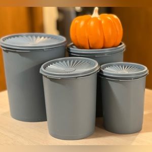 Blue Tupperware canisters set of four with lids